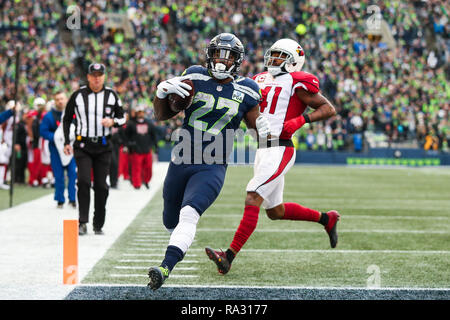 Seattle, WA, USA. Dec 30, 2018. Seattle Seahawks tournant retour Mike Davis (27) marque un touchdown lors d'un match entre l'Arizona Cardinals et les Seattle Seahawks au champ CenturyLink à Seattle, WA. Les Seahawks défait les cardinaux 27-24. Sean Brown/CSM/Alamy Live News Banque D'Images