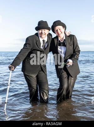 Portobello, Édimbourg, Écosse, Royaume-Uni. 06Th Jan, 2019. La traditionnelle Loony Dook a eu lieu à Portobello juste à l'extérieur d'Édimbourg. Revelers dressed in costumes faites un plongeon dans le Firth of Forth à bienvenue dans la nouvelle année. Credit : Riche de Dyson/Alamy Live News Banque D'Images