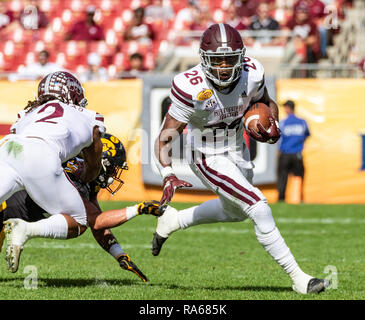 Tampa, Floride, USA. 06Th Jan, 2019. Mississippi State Bulldogs tournant retour Aeris Williams (26) exécute la balle au 1er semestre au cours du match entre le Mississippi State Bulldogs et l'Iowa Hawkeyes dans l'Outback Bowl chez Raymond James Stadium de Tampa, Floride. Del Mecum/CSM/Alamy Live News Banque D'Images