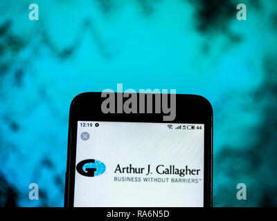 Arthur J. Gallagher & Co. d'avion logo de l'entreprise vu affichée sur smart phone Banque D'Images