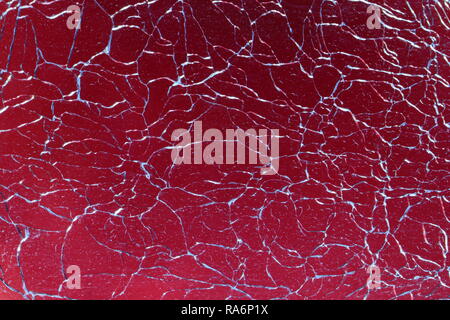 Résumé Contexte La conception du verre brisé. 12.2005, verre brisé contre l'arrière-plan rouge. Banque D'Images