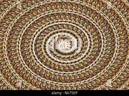 Pour en spirale dans l'arrière-plan de couleur marron à partir de petits fragments Banque D'Images