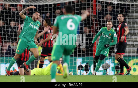 Troy Deeney de Watford (à gauche) célèbre marquant son but premier du côté du jeu au cours de la Premier League match au stade de vitalité, de Bournemouth. Banque D'Images