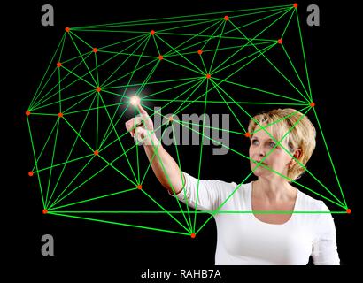 Femme avec un modèle virtuel, l'image symbolique pour les réseaux, la mise en réseau Banque D'Images