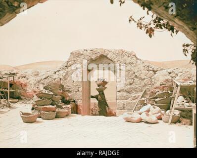 Les fouilles. Ain Shems (Beth Shemesh) sur la plaine de Sharon. En faisant venir les 'shuk'f." fragments de poterie d'être frottées repensé Banque D'Images