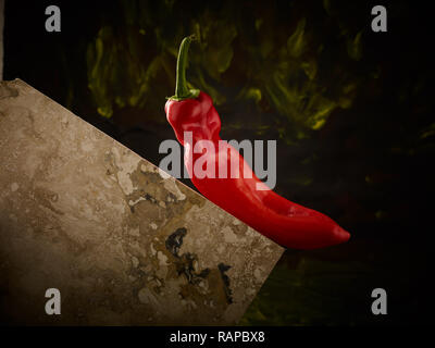 Poivre rouge tuile et culinaire abstrait nature morte photographie Banque D'Images