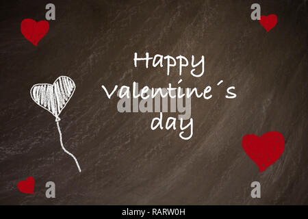 Valentine's day written on blackboard Banque D'Images