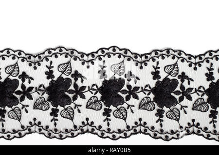 Dentelle noir sur fond blanc ; texture background Banque D'Images