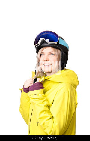 Portrait d'une jeune femme vêtue de noir, jaune veste de snowboard casque et lunettes Banque D'Images