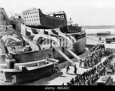 Photo de l'embarquement des troupes américaines à bord d'un navire britannique. Sous le chaud soleil de l'Algérie, l'exécution, les hommes packs complet shuffle le long en double file en attente d'être coché au pied de la passerelle et de gravir les pentes plank sur le bateau. Datée 1942 Banque D'Images