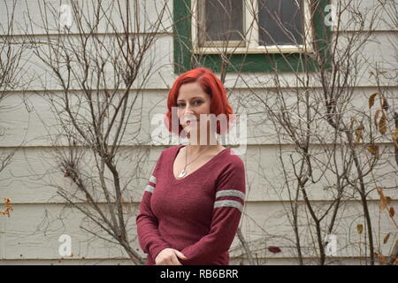 Jolie dame aux cheveux rouges Banque D'Images