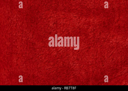 Fourrure rouge texture background. Surface douce en coton laine Banque D'Images