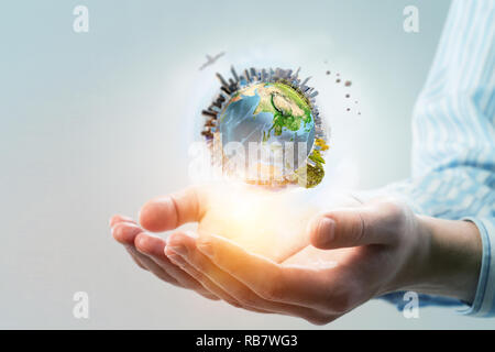 Monde entier dans les mains Banque D'Images