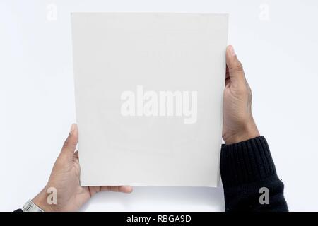 Photo de l'homme main est holding blank magazine. Banque D'Images