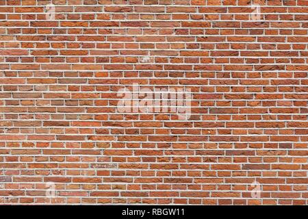 Mur de brique rouge. La texture de l'architecture d'Amsterdam. Banque D'Images