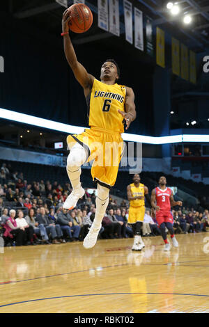 London, Ontario, Canada. 10 janvier, 2019. Le Cape Breton Highlanders revint à Londres avec un 11 et 6 notice et joué un très déterminé London Lightning équipe qui a pris le jeu en prolongation. Dans le supplément de 5 minutes trimestre les Highlanders ont dominé l'éclair et réussi une victoire 129-122. Alex Johnson(6) va dans pour un panier. Luc Durda/Alamy live news Banque D'Images