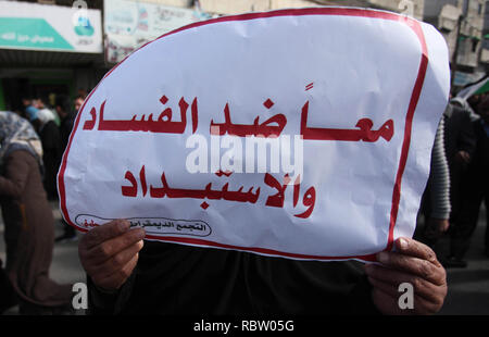 La ville de Gaza, bande de Gaza, territoire palestinien. Jan 12, 2019. Les partisans palestiniens du Front démocratique de libération de la Palestine, de prendre part à une manifestation pour soutenir le peuple palestinien les efforts de réconciliation entre le Fatah et le Hamas et d'aganist l'affaire du siècle, dans la ville de Gaza le 12 janvier 2019 Credit : Mahmoud Ajjour/APA/Images/fil ZUMA Alamy Live News Banque D'Images