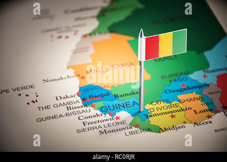 Guinée Belgique marqués d'un drapeau sur la carte Banque D'Images