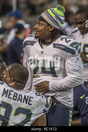 Oakland, Californie, USA. 28 août, 2014. Seattle Seahawks running back Marshawn Lynch (24) le jeudi, Août 28, 2014, dans la région de Oakland, Californie. Les raiders battu les Seahawks 41-31. Dans un match pré-saison. Crédit : Al Golub/ZUMA/Alamy Fil Live News Banque D'Images