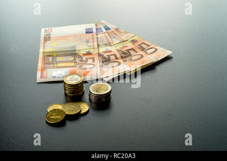 Finances - concept de l'argent sur un bureau. Banque D'Images