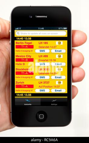 Iphone, téléphone, l'app sur l'écran, les départs, arrivées, et des liaisons aériennes, Banque D'Images