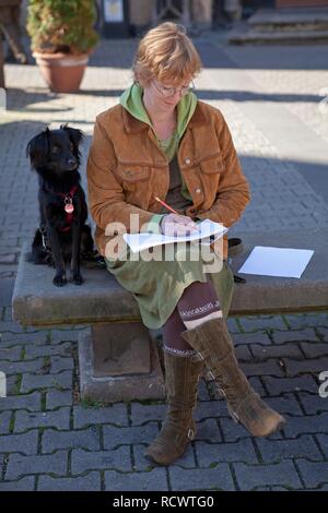 Dessin femme avec chien, Erfurt, Thuringe Banque D'Images