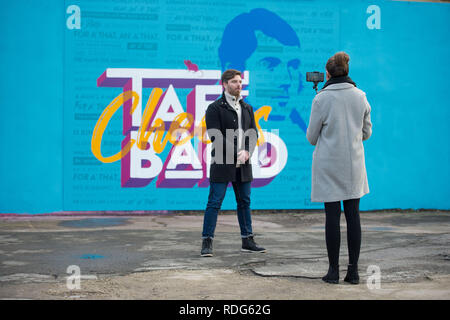 Glasgow, Royaume-Uni - 14 janvier 2019. Ministre pour l'Europe, la migration et le développement international Ben Macpherson dévoile une nouvelle peinture murale créée par Scottish Banque D'Images