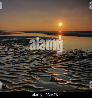 Lever du soleil à Camber Sands. Kent en Angleterre. Banque D'Images