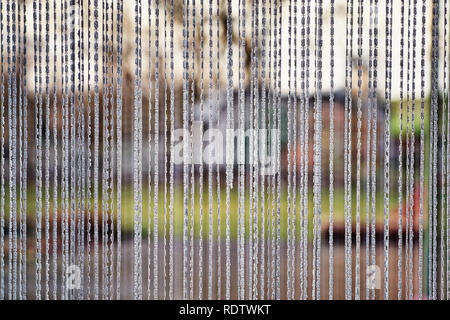 Des rideaux blancs avec texture à la fenêtre comme motif de fond. Banque D'Images