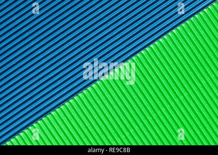 Abstract background créé avec détails rayé de vert et bleu en carton ondulé Banque D'Images