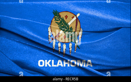 État de l'Oklahoma drapeau réaliste sur la surface d'un tissu. Parfait pour les fins de l'arrière-plan ou de texture. Banque D'Images