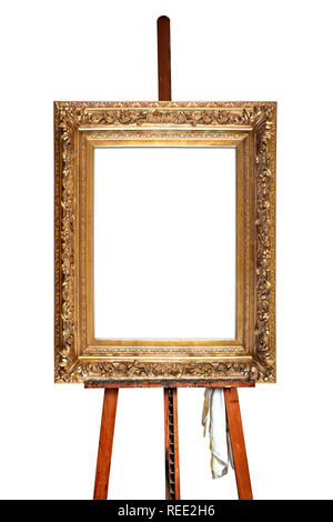 Chevalet de peintre et ancien cadre doré vide isolé avec clipping path Banque D'Images