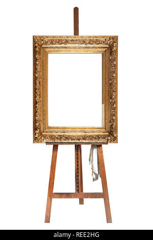 Chevalet de peintre et ancien cadre doré vide isolé avec clipping path Banque D'Images