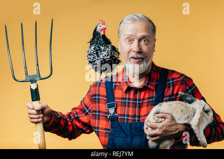 Genre Funny Farmer après le travail Banque D'Images