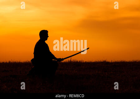 Silhouette de chasseur de kendo bokuto holding Banque D'Images