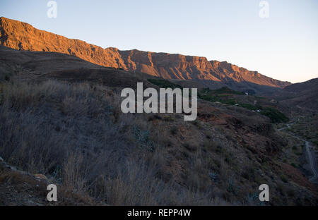 Vue du coucher de soleil sur Barranco de Fataga, Gran Canaria, Îles Canaries, Espagne Banque D'Images