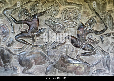 Guerriers à cheval dans la frise en bas-relief représentant la victoire de Krishna sur Bana la tribune nord mur, Angkor Wat, Siem Reap, Cambodge Banque D'Images