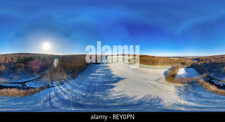 Vue panoramique à 360° de Prairie couverte par la première neige et un terrain de football au bord de l'Elms Königslutter, Allemagne, en vue aérienne, spherical panorama 360 degrés