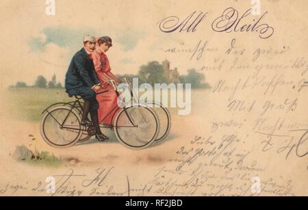 Photographie historique d'un couple riding bicycles, ancien script, prises ca. 1898 Banque D'Images