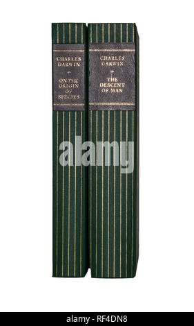 Éditions Folio Society of Charles Darwin's "à l'origine des espèces" et "La Descente de l'homme', épines montrant isolé sur fond blanc, pur. Banque D'Images