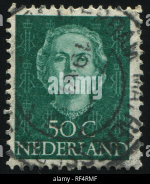 Russie KALININGRAD, 27 juin 2017 : timbres par Pays-bas montre Queen Juliana, vers 1949 Banque D'Images