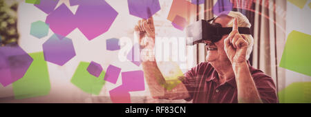Man en utilisant un appareil de réalité virtuelle Banque D'Images