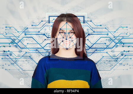 Young caucasian woman système de reconnaissance faciale. Technologie futuriste face id scanning 3D concept. La vérification biométrique et la détection. Les droits de l'identi Banque D'Images