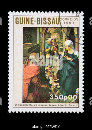 Timbre-poste de la Guinée-Bissau illustrant la Dürer peinture de la Vierge et l'enfant. Banque D'Images