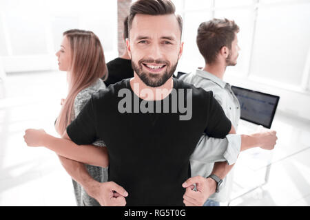 Tenir la main ensemble en équipe pour réussir quelque chose ou prendre soin. Banque D'Images