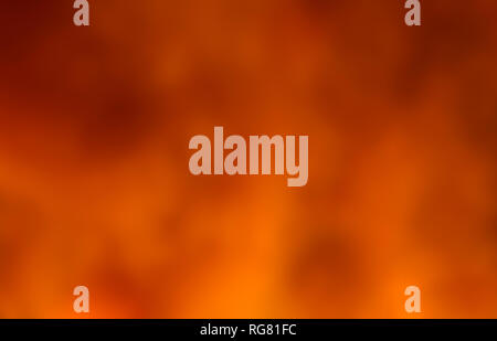 Résumé fond de couleurs rouge et orange brouillée, représentant le feu. Banque D'Images