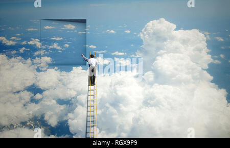 Businessman standing et de l'escalade jusqu'à la fenêtre. Technique mixte Banque D'Images
