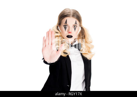 Blonde female clown montrant le geste d'arrêt isolated on white Banque D'Images