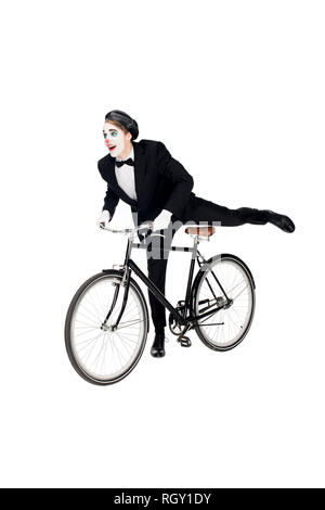 Costume Clown joyeux dans riding bicycle isolated on white Banque D'Images