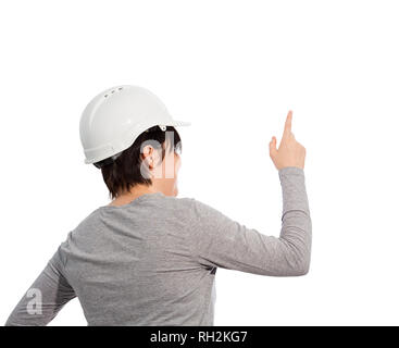 Vue arrière de l'ingénieux ingénieur jeune femme casque de protection portant l'index pointant vers le haut plus isolé sur fond blanc avec l'exemplaire de l'espace. Banque D'Images